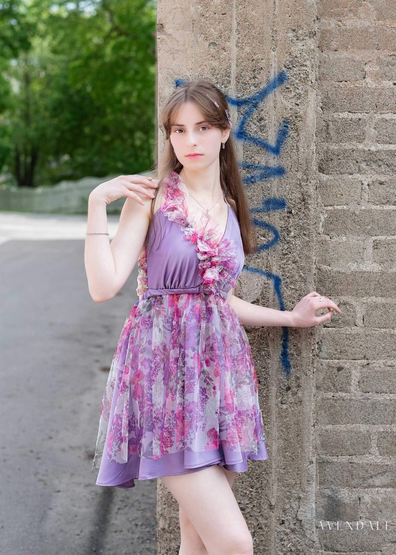Lilac floral mini dress with ruffled neckline and tiered skirt
