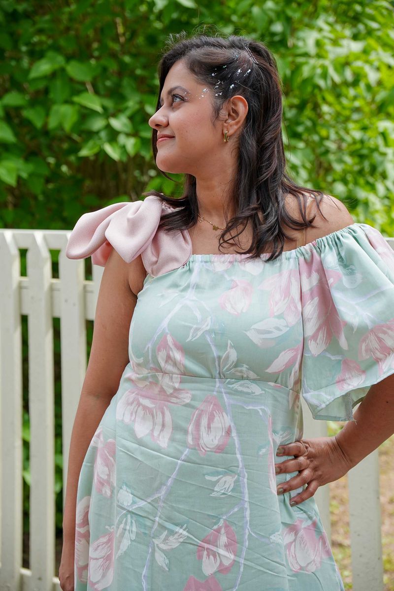 Mint green floral dress with pink puff sleeves